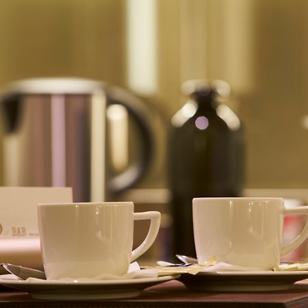 Portobay Flores Extérieur photo Coffee and tea service